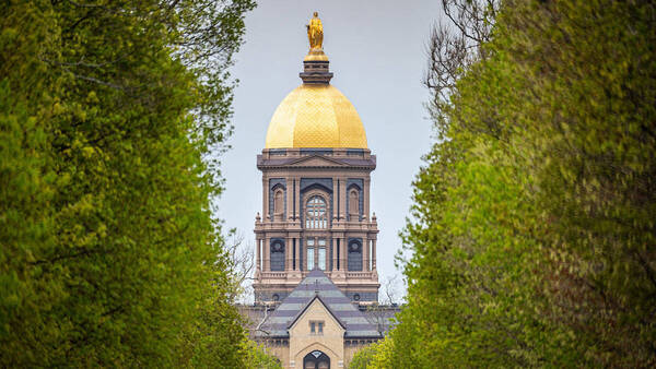 A photo of the Golden Dome of the University of Notre Dame's Main Building.