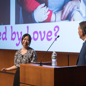 Ph.D. candidate Sara Chan converses with Master of Ceremonies Lou Nanni after her 3MT presentation in the 2023 finals.