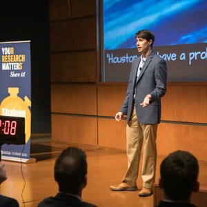 Ph.D. candidate Joseph Gonzales presents at the finals of the 2023 3MT competition.