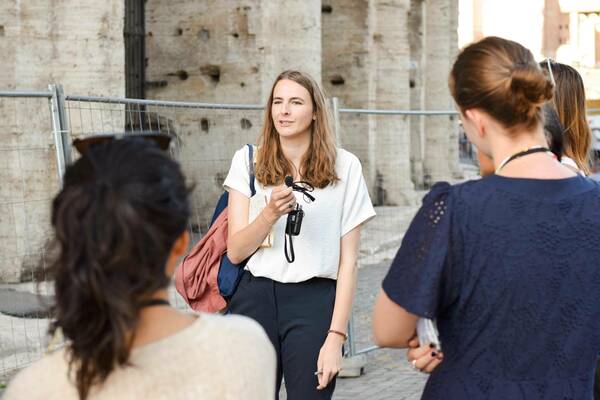 Postdoctoral fellow Katie Sparrow '18 M.A., '23 Ph.D. leads a class in Rome.