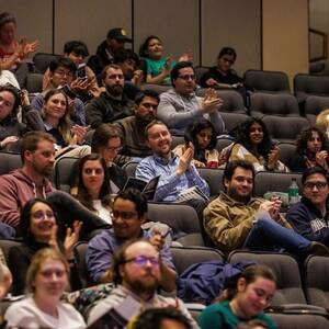 Audience members at the 2024 Shaheen 3MT competition.